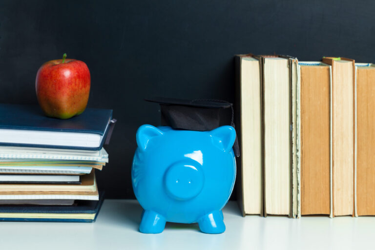 Piggy safe between books.