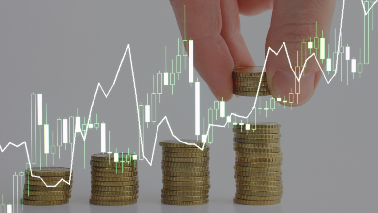 The image shows piles of currency growing next to a financial graph.