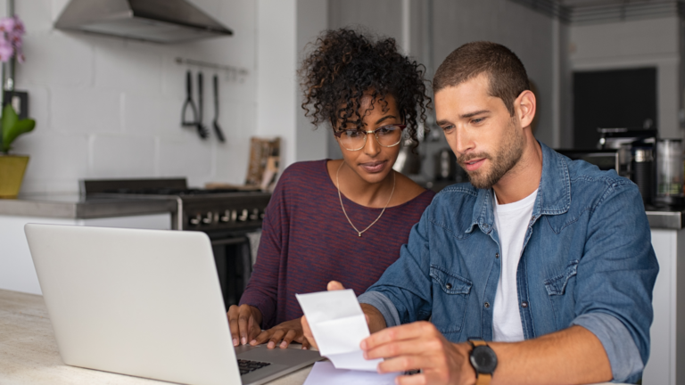 Couple doing financial planning.